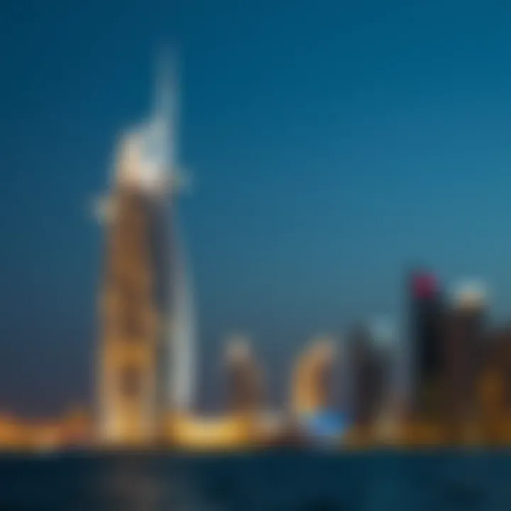 Dolphin Tower at night with illuminated skyline