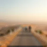 Scenic view of Al Qudra cycling path surrounded by desert landscape