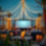 A stunning outdoor cinema setup in Dubai with a large screen surrounded by fairy lights.