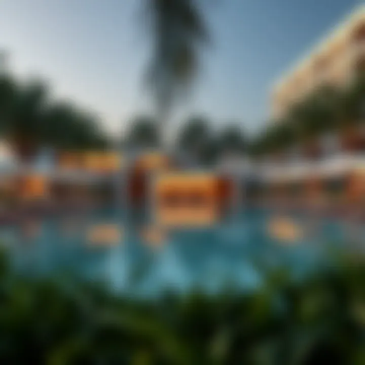 Luxurious swimming pool surrounded by palm trees at Oceana Residence